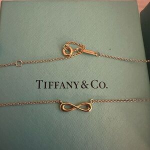 Tiffany & Co. Gold Infinity Necklace on Silver Chain
